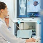 Female medical worker on phone.